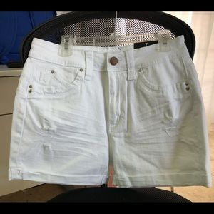 New. FashionNova. Ripped denim shorts. Size 7.